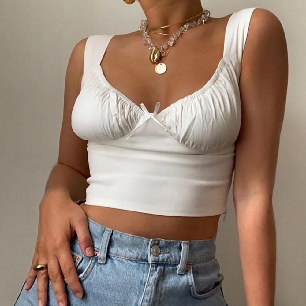 White sleeveless top